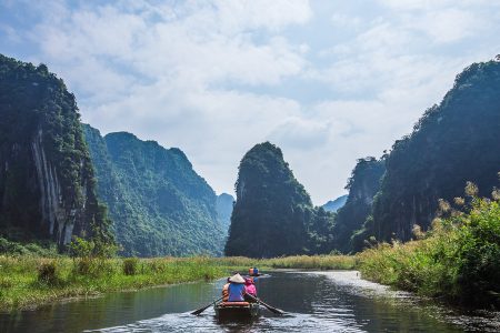 Paddle boat rides in Tràng An or Tam Cốc are the highlight of most trips to Ninh Bình.